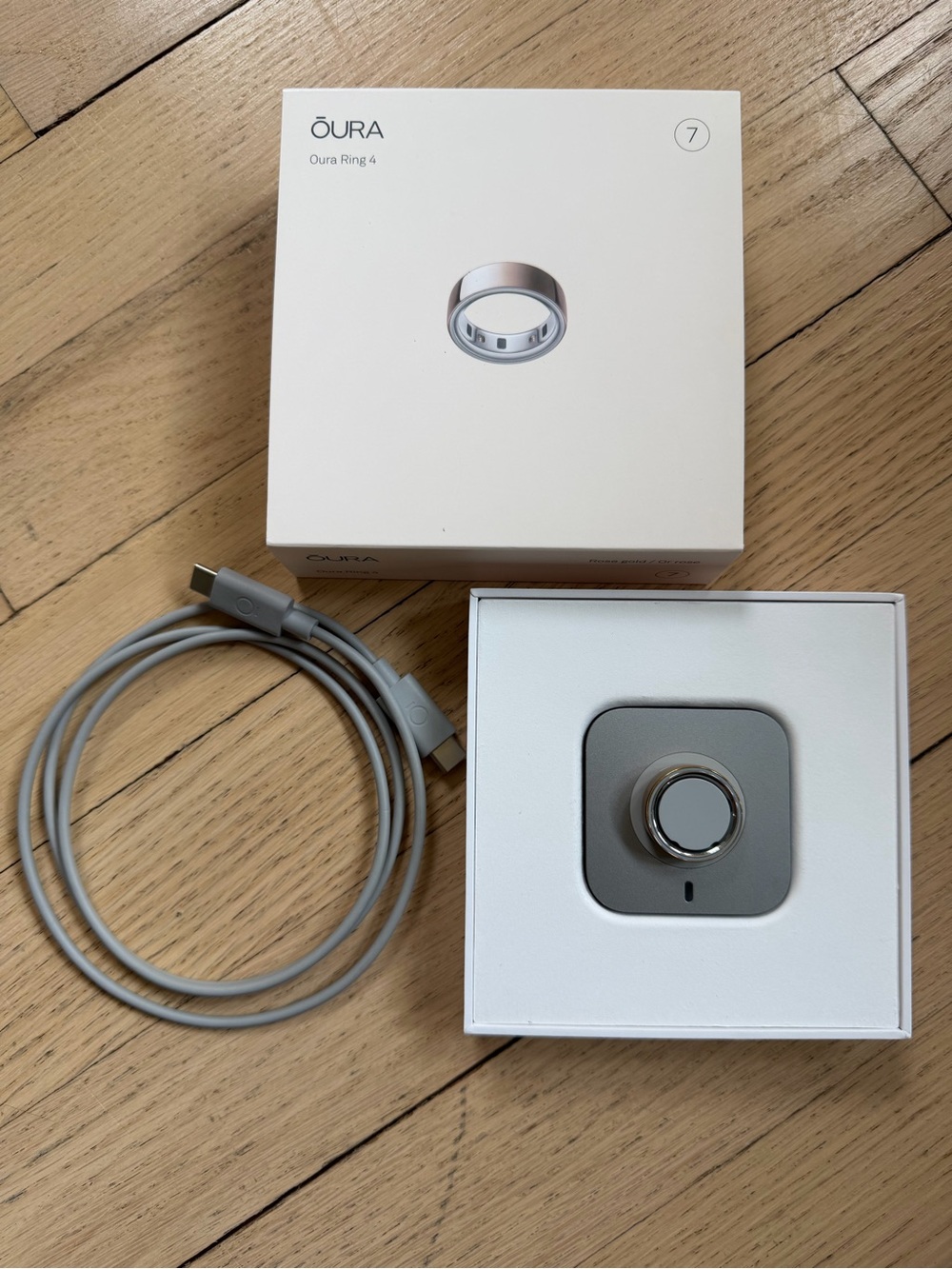Oura Ring 4 Rose Gold with Gray Charging Cable